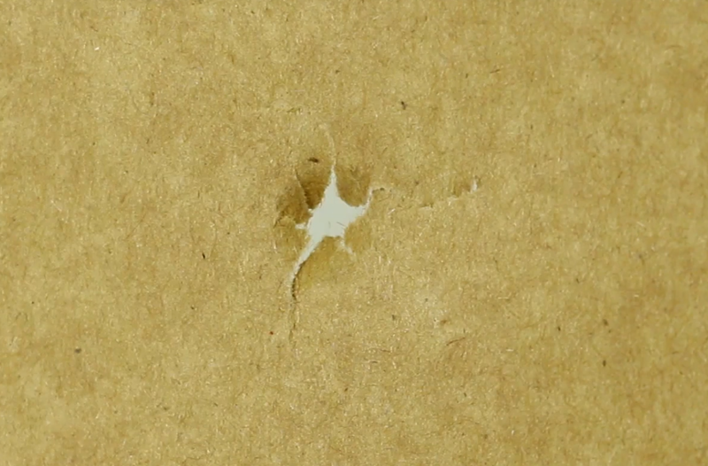 File:Paper tuning bullet hole.PNG